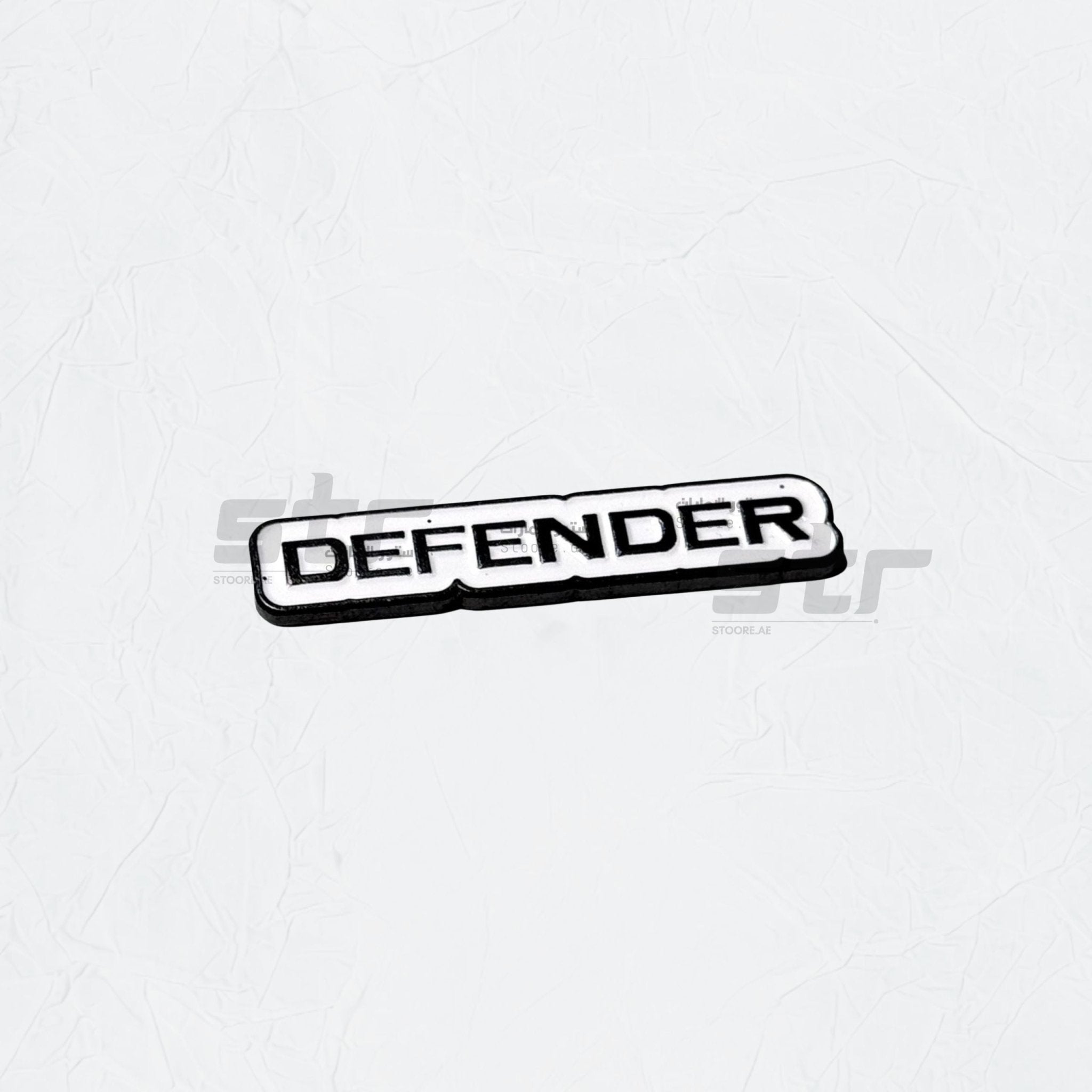 Badge DEFENDER